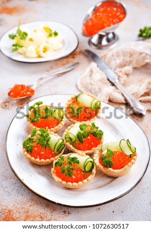 Similar – Puff pastry tarts with nectarines, camembert and thyme