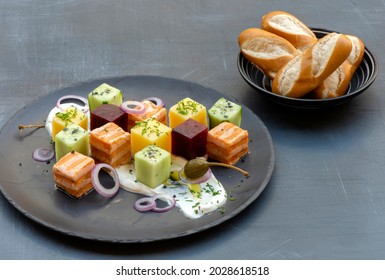 Salmon Cubes Plate With Beetroot Cubes, Cucumber Cubes, Potatoes Cubes, Cream Cheese, Chives, Red Onion And Capers, Served With Soft Pretzel Stick 