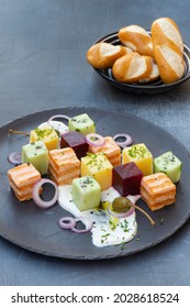 Salmon Cubes Plate With Beetroot Cubes, Cucumber Cubes, Potatoes Cubes, Cream Cheese, Chives, Red Onion And Capers, Served With Soft Pretzel Stick 