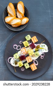 Salmon Cubes Plate With Beetroot Cubes, Cucumber Cubes, Potatoes Cubes, Cream Cheese, Chives, Red Onion And Capers, Served With Soft Pretzel Stick 