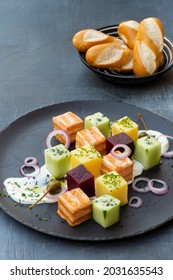 Salmon Cubes Plate With Beetroot Cubes, Cucumber Cubes, Potatoes Cubes, Cream Cheese, Chives, Red Onion And Capers, Served With Soft Pretzel Stick 