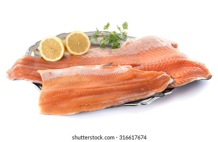 salmon fillet in front of white background - Shutterstock ID 316617674