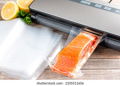 Salmon fillets in a vacuum package. Sous-vide, new technology cuisine. - Shutterstock ID 2105511656