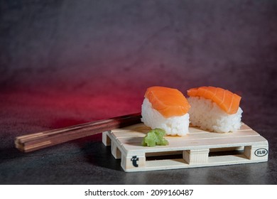 salmon fillets and white rice accompanied by wasabi