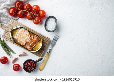 Salmon, Fish Preserves Canned Smoked Fish Set, On Wooden Cutting Board, On White Background With Herbs And Ingredients, Top View Flat Lay, With Copyspace And Space For Text