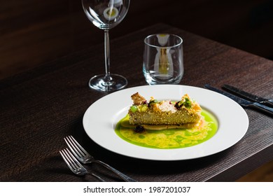 Salmon With Fresh Vegetables And Green Sauce Served On White Plate. Fine Dining Gourmet Food