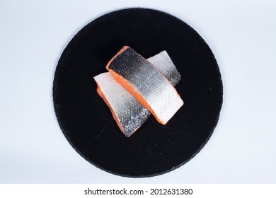 Salmon Good For Grill With The Skin And Oven For Skinless And Plated On A Rock Round Plate