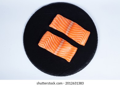 Salmon Good For Grill With The Skin And Oven For Skinless And Plated On A Rock Round Plate