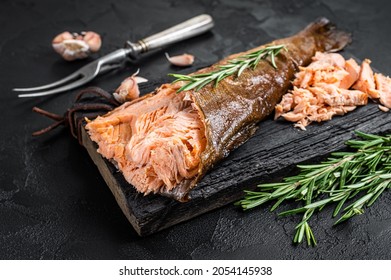 Salmon Hot smoked, trout fish meat. Black background. Top view