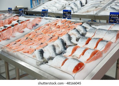 Salmon on cooled market display, tm's removed from price tags
