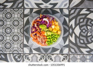 Salmon Poke Bowls With Edamame Beans, Pineapple And Coleslaw