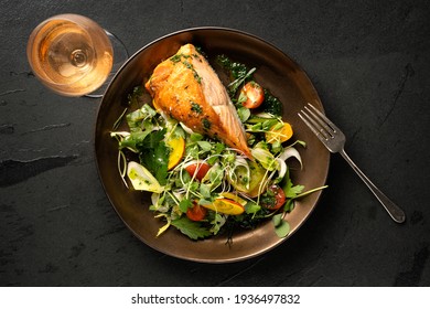 Salmon And Salad On A Plate