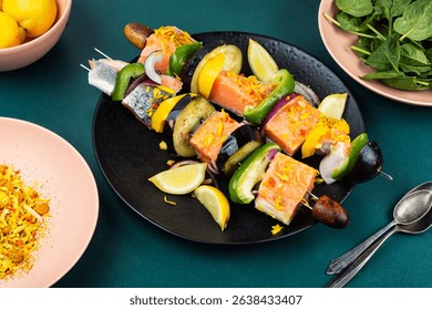 Salmon skewers BBQ, delicious skewers from raw salmon with fresh vegetables.
