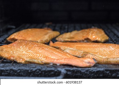 Salmon Smoking In An Oven, Finland