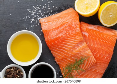 Salmon And Spices On Stone Table. Top View