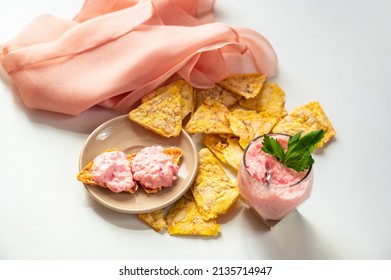 Salmon Spread Cracker, Spread Bowl, Maize Cracker And Pink Scarf On White Background, Closeup.