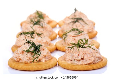 Salmon Spread On Cracker Cookies On White Background