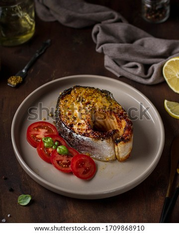 Salmon steak baked with Jion mustard on a plate. Stock photo © 