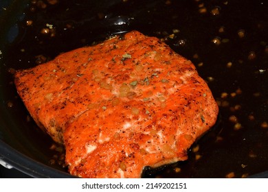 Salmon Steak In A Skillet. Close Up Shot.