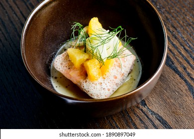 Salmon Steaks. Salmon Sautéed In Organic Butter, Garlic And Served With Jumbo Lump Crab Cake, Cauliflower, Broccoli And Potatoes. Classic American Restaurant Or French Bistro Entree Favorite.