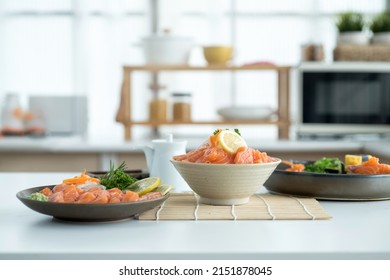 Salmon Sushi Japanese tradition food on table in modern kitchen - Powered by Shutterstock