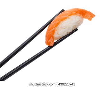 Salmon sushi nigiri in black chopsticks - Powered by Shutterstock