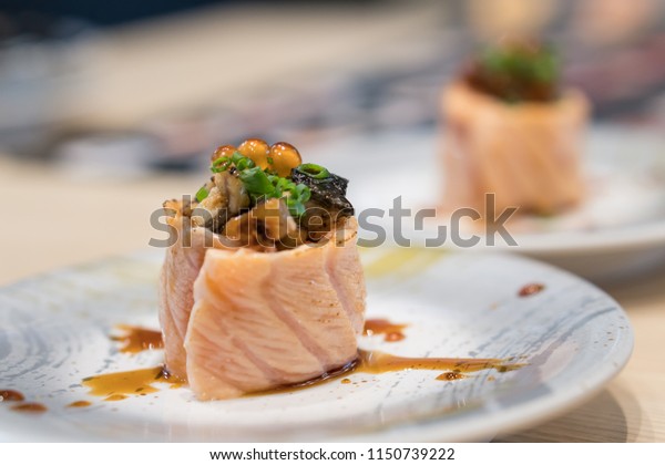 Salmon Sushi Roll On Plate Eel Stock Photo Edit Now 1150739222