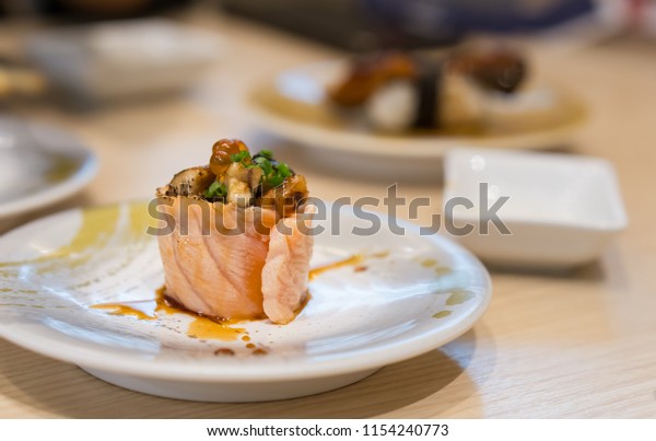 Salmon Sushi Roll On Plate Eel Stock Photo Edit Now 1154240773