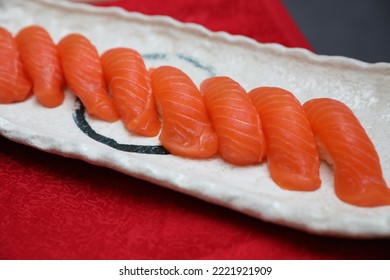 Salmon sushi is a traditional delicacy. - Shutterstock ID 2221921909