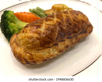 Salmon Wellington In Puff Pastry.