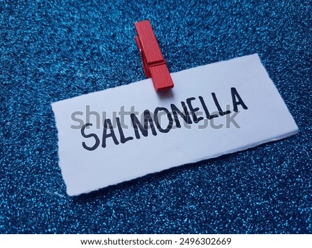 Salmonella writting on blue background.