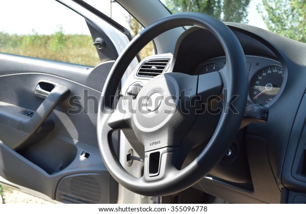 Salon of the\
car with an open door. Car\
interior.
