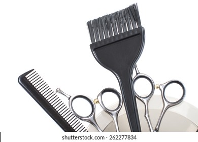 Salon Mixing Bowl, Application Brush, Shears And Sectioning Comb For Hair Dye Or Colored Highlights. Isolated On White