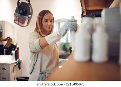 Salon, Professional Hairdresser And Hair Care Shampoo Treatment On Product Display In Boutique. Small Business Owner, Cosmetic Wellness Woman Working And Beauty Products Shelf Arrangement In Store