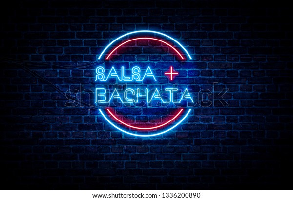 Salsa and Bachata written on a red and\
blue neon sign, with a brick wall in the\
background.