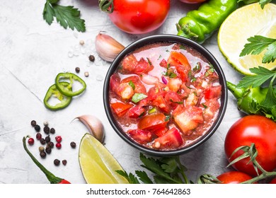 Salsa Sauce And Ingredients On Stone Table. Traditional Latin American Mexican Food. Top View With Copy Space.