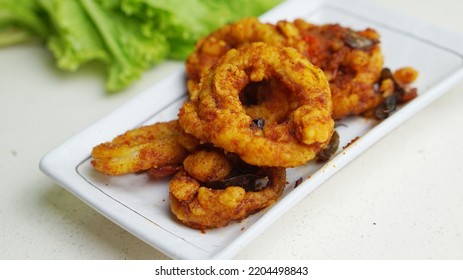 Salt And Chilli Squid On White Background. Close Up