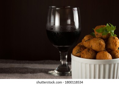 Salt Cod Croquettes. Salt Cod Fritters In A White Ramekin And Parsley, On A Table Towel. Selective Focus. Dark Wooden Background. Copy Space