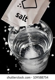 Salt Flow In A Water Glass