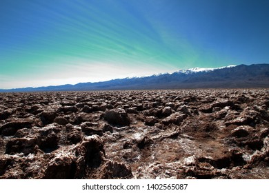 Salt formations and distant mountain range - 13mm wide angle