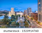 Salt Lake City, Utah, USA downtown cityscape over Temple Square at dusk.