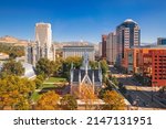 Salt Lake City, Utah, USA downtown cityscape over Temple Square with autumn foliage.