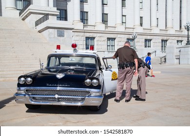 Salt Lake City, Utah, USA - October 8, 2016. Historical police car in front of the Utah State Capitol.