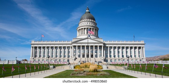 Salt Lake City, Utah, USA - October 8, 2016. Facade of the Utah State Capitol decorated with national flags.