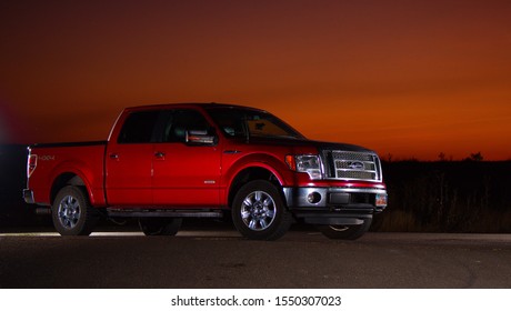 old red ford pickup truck