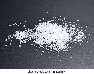 salt on a slate plate. High angle view.