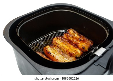 Salt And Pepper, And Gochujang Korean Sauce Fermented Pork Belly Roasted In Air Fryer To Reduce Less Oil And Fat Isolated On White Background