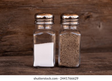 Salt and pepper shakers to season food. - Powered by Shutterstock