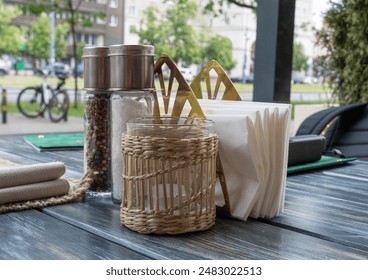 Salt and Pepper Shakers Wooden Table, Salt Container, Spices Jar, Black Pepper Bottle Shakers, Seasoning Mill, Condiments Set on Restaurant Table - Powered by Shutterstock