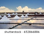 Salt piles in field prepared for harvest. Traditional seasalt collection method in Taiwan